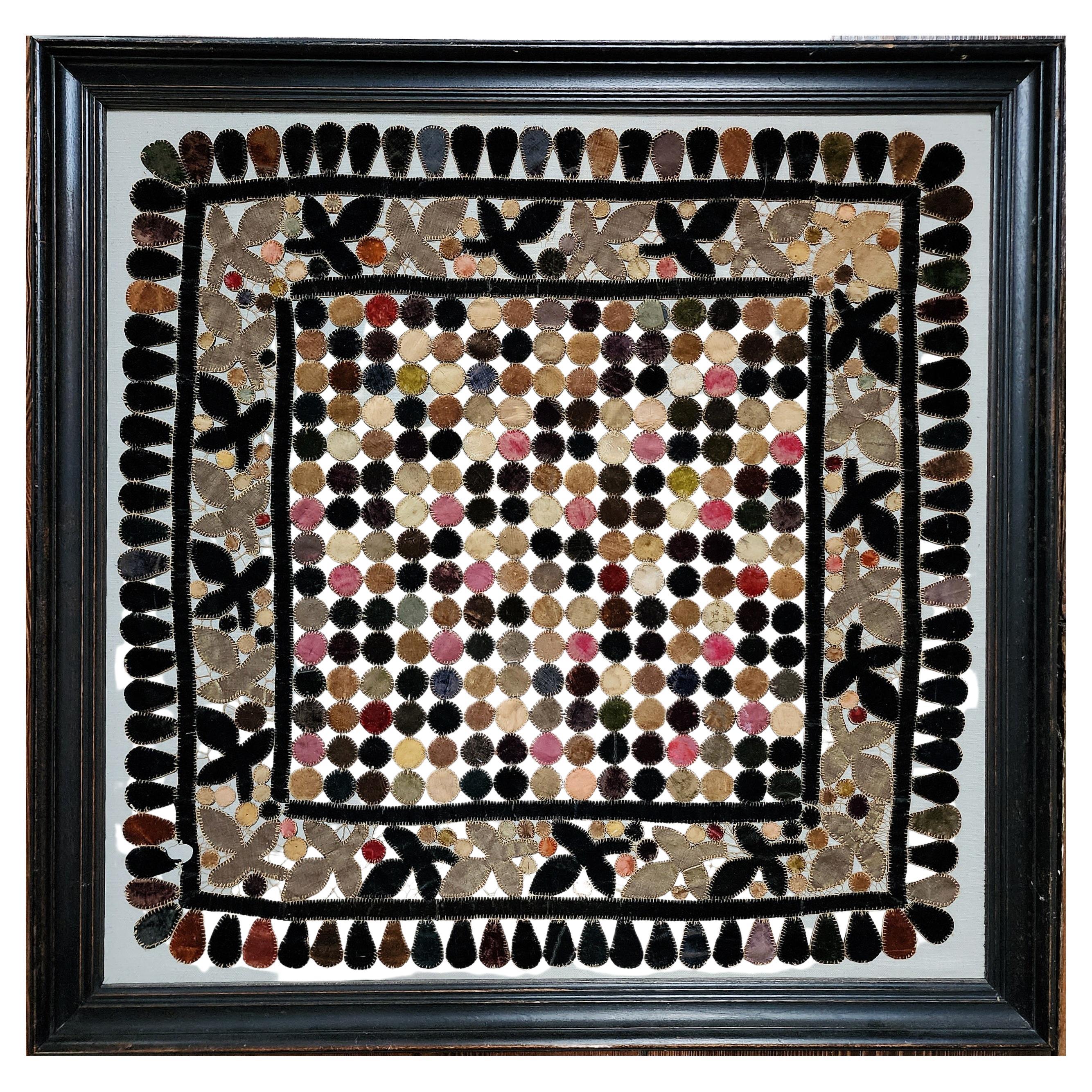 This is an absolutely beautiful and rare form penny work table rug. American circa eighteen seventy and an excellent condition. What makes this so rare is the pattern of leaf and berries,  along with the fact that it is open work. The colors are