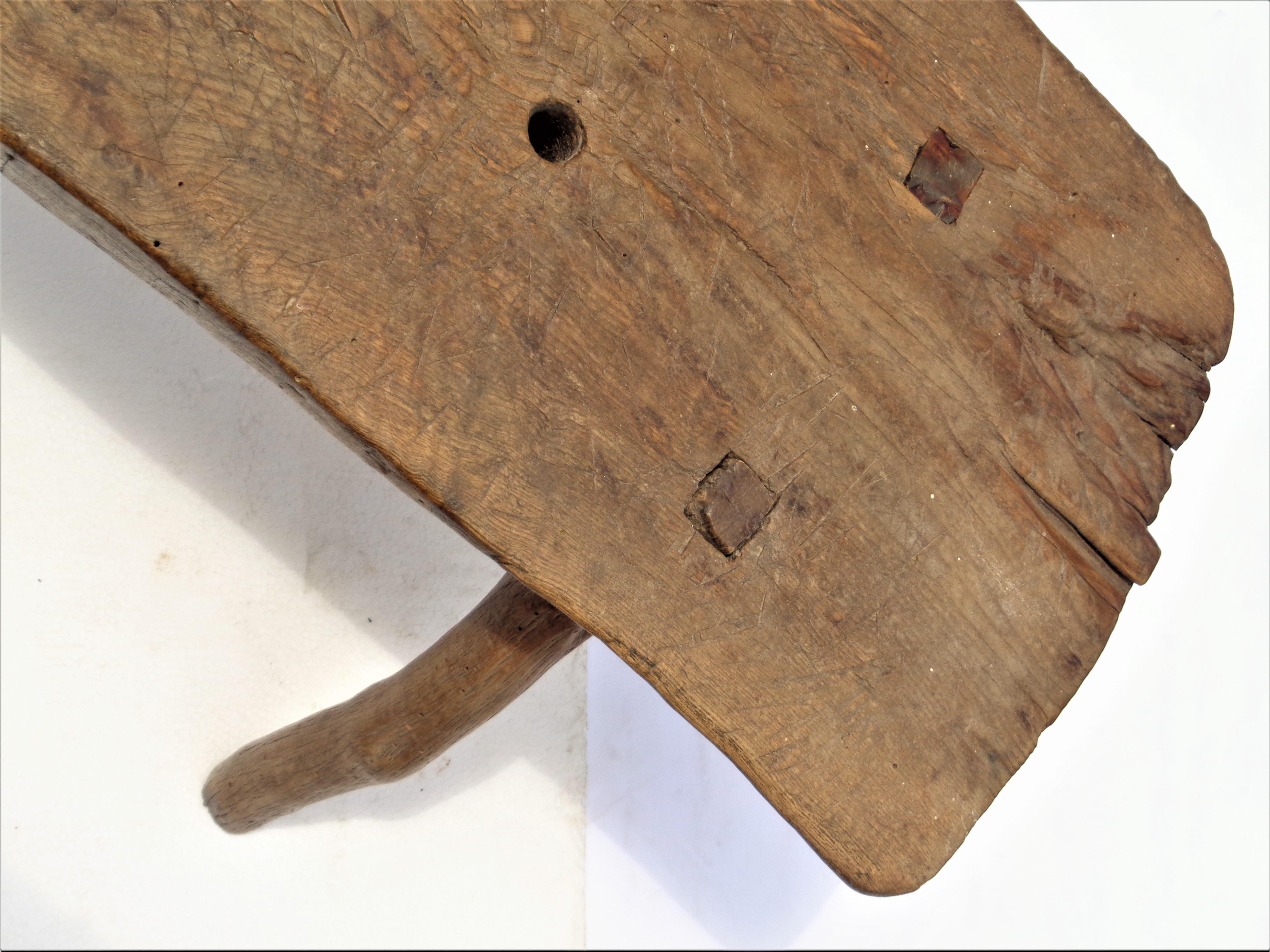 primitive wooden stool
