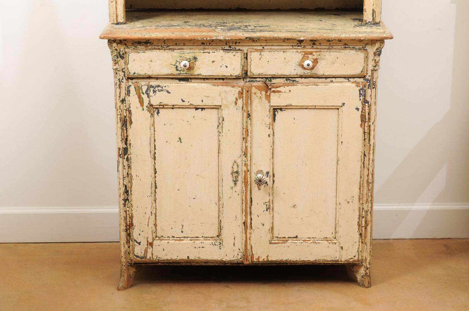 tall rustic cabinet with glass doors