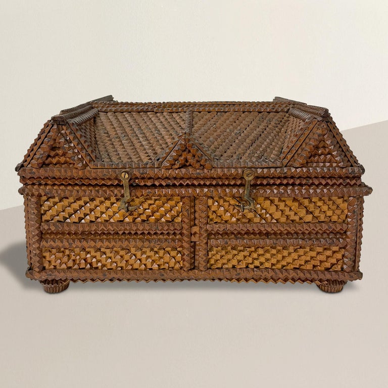 A charming 19th century American Tramp Art box of architectural form with the lid being a roof with several dormers. The inside retaining its original red cotton lining, and mirror on the lid.