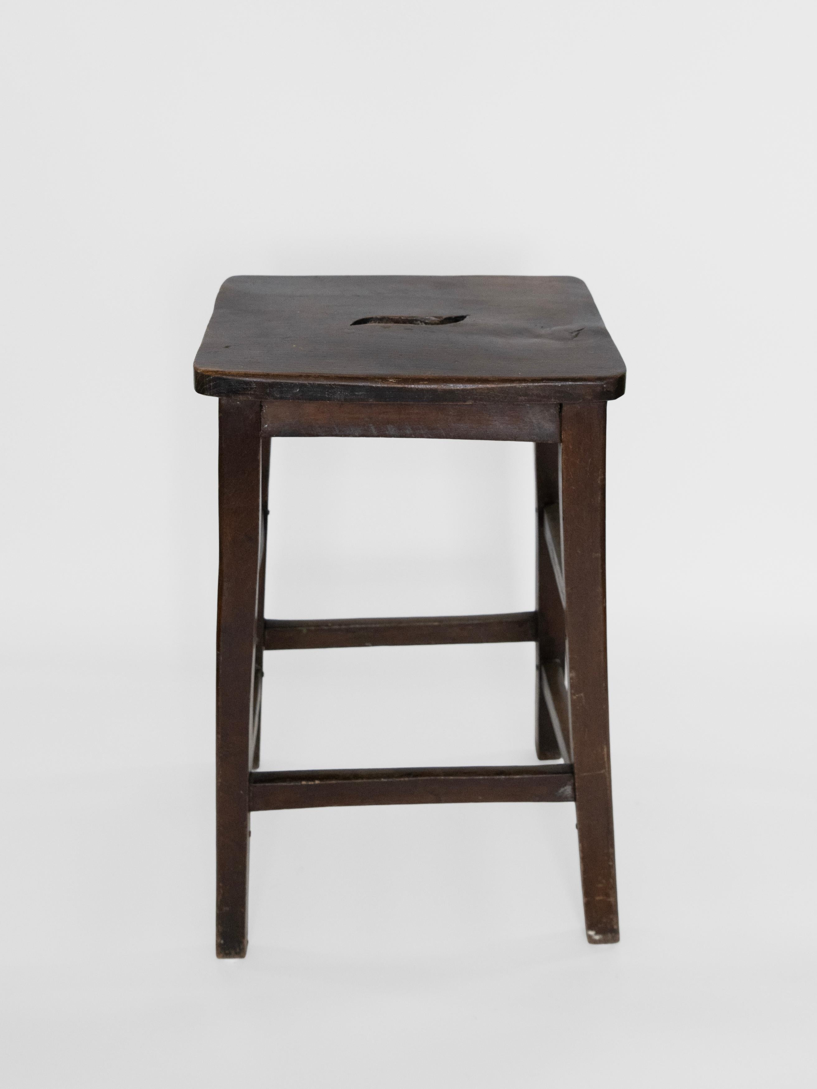 19th Century American (New England)  Workshop /Stool Kitchen Farmhouse/ Stool with cut hand hole for easy placement in schoolrooms, kitchens, shops and factories. Elegant style to this utilitarian piece 