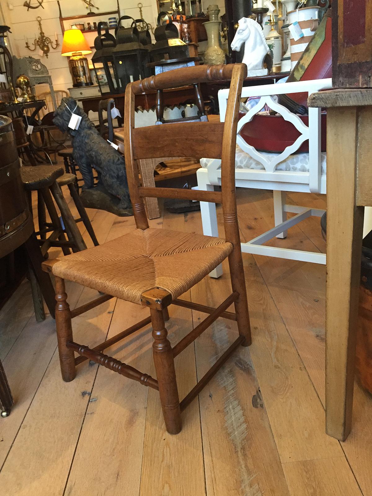 19th century American work child's chair with rush seat.