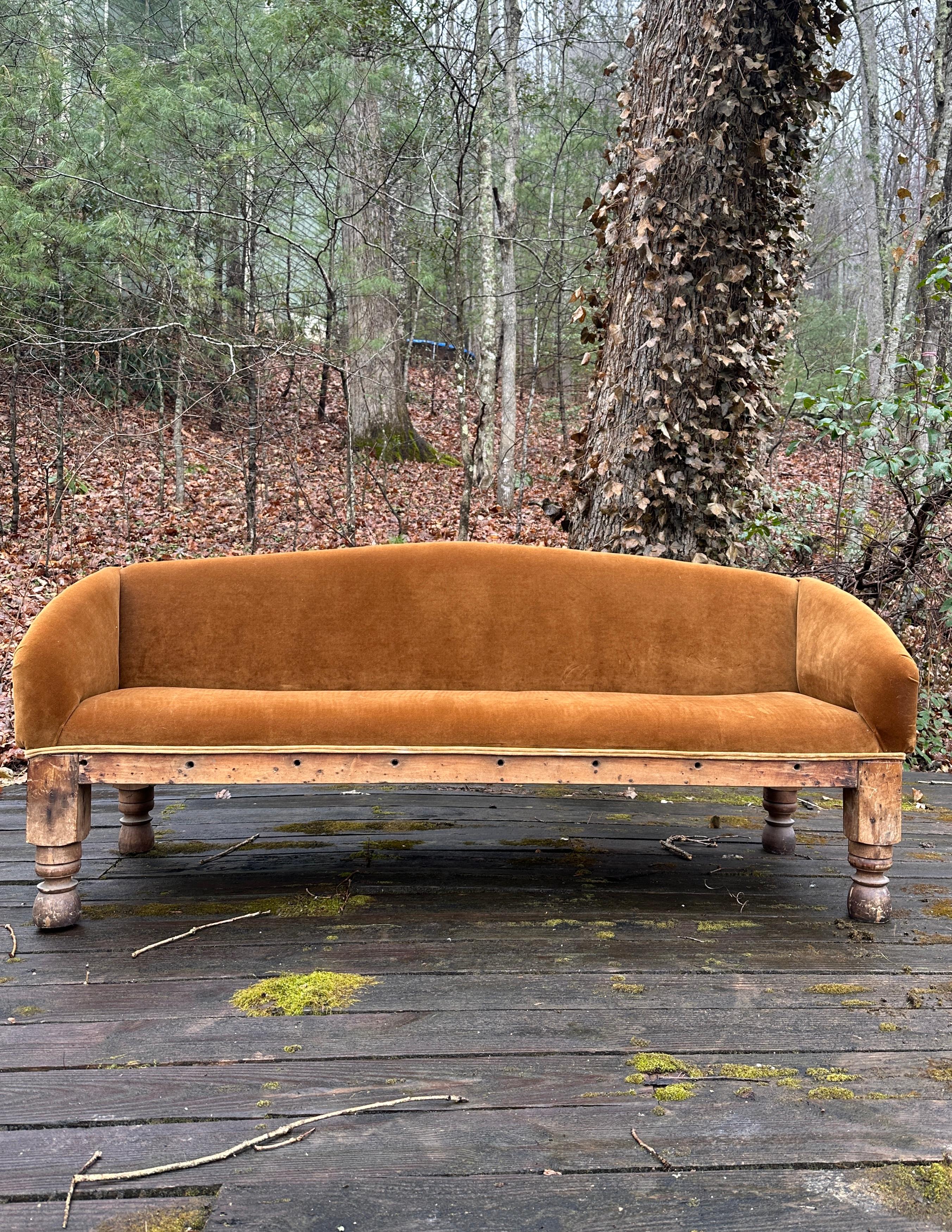 Victorian style 1920s Americana sofa featuring a solid oak frame and recently upholstered in brown velvet with lighter rim?

Measures: 74”W x 27.5��”D x 29”H x 17” Seat H x 23” Arm H.