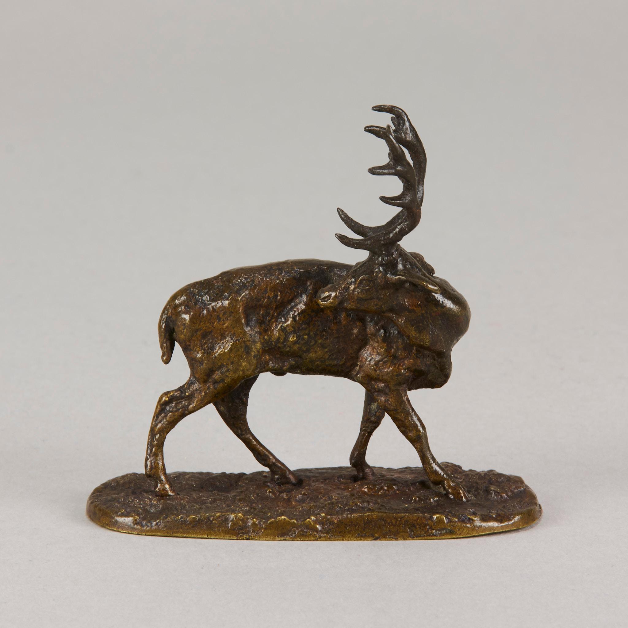 Very fine mid 19th century French animalier miniature bronze study of a standing stag with head turned looking behind. The bronze with good textured surface and fine rich brown lightly rubbed to golden brown patina, raised on a naturalistic base and