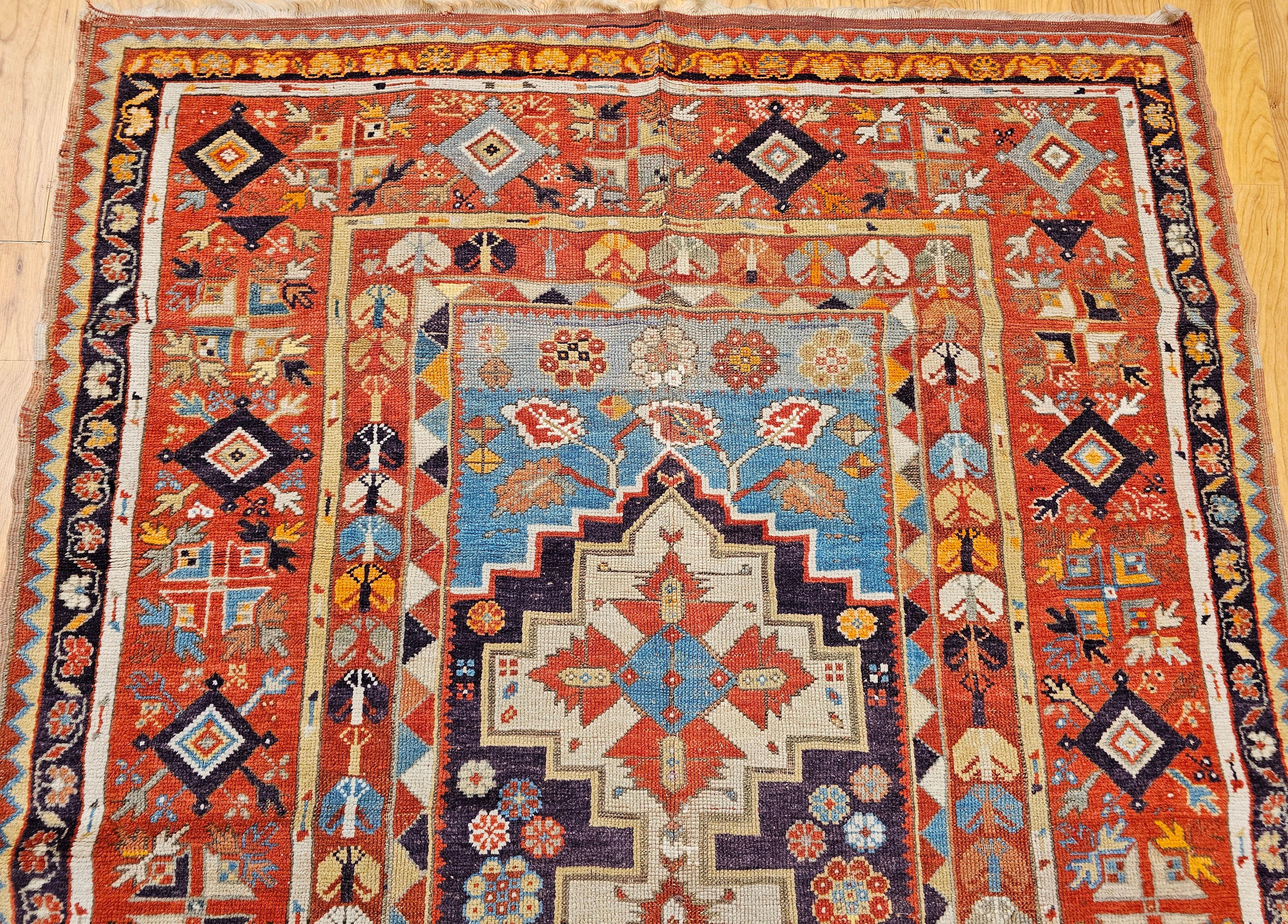 Turco Tappeto Anatolian Village del XIX secolo in viola, turchese e rosso in vendita