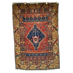 19th Century Anatolian Village Area Rug in Red, Navy 
Yellow