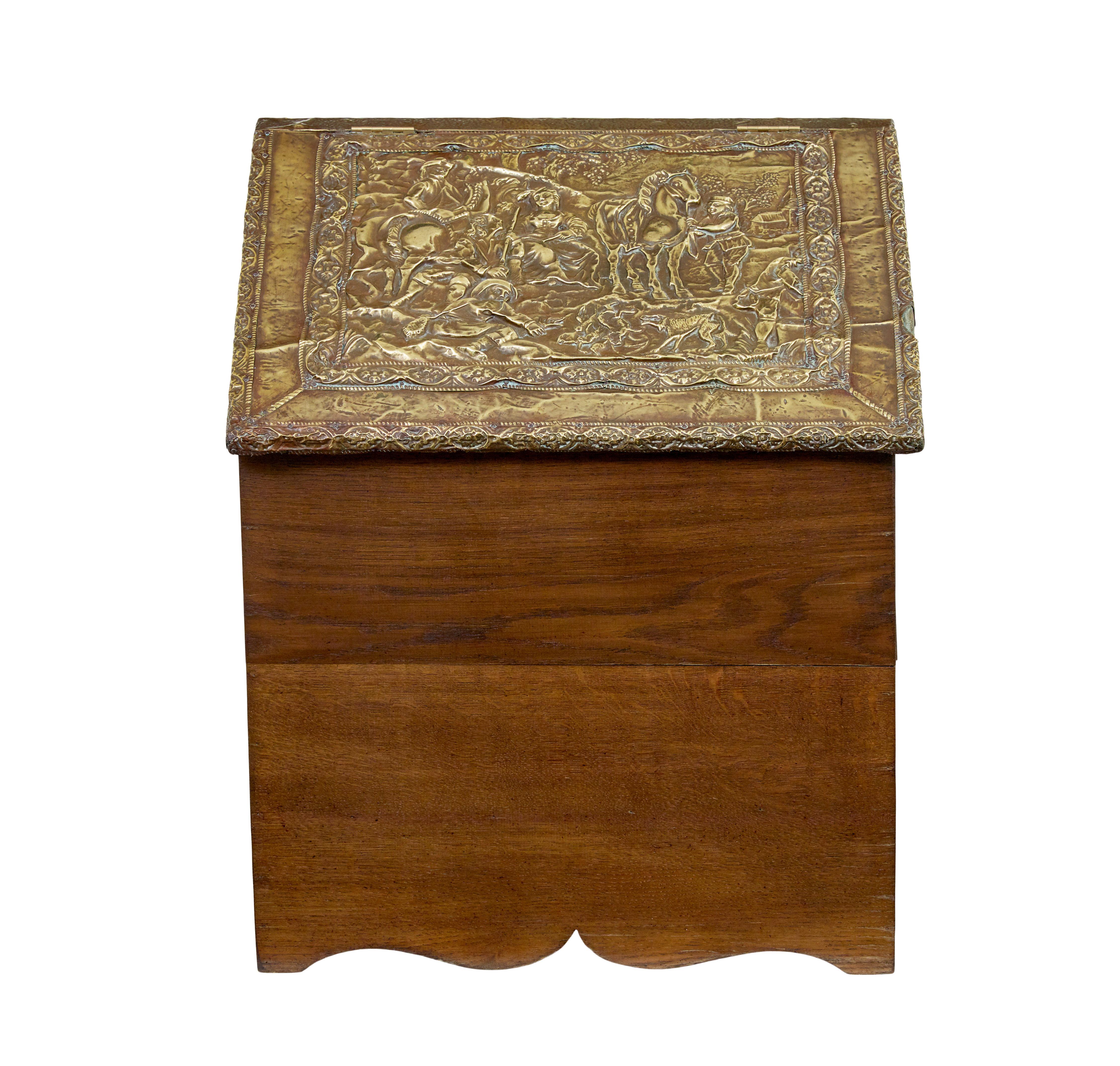 19th century and later oak and brass storage box circa 1896.

Good quality storage box by Goodyers of regent street and bond street of london.  Original brass embossed brass lid which depicts a traditional hunting scene.  Later clad in a plain oak