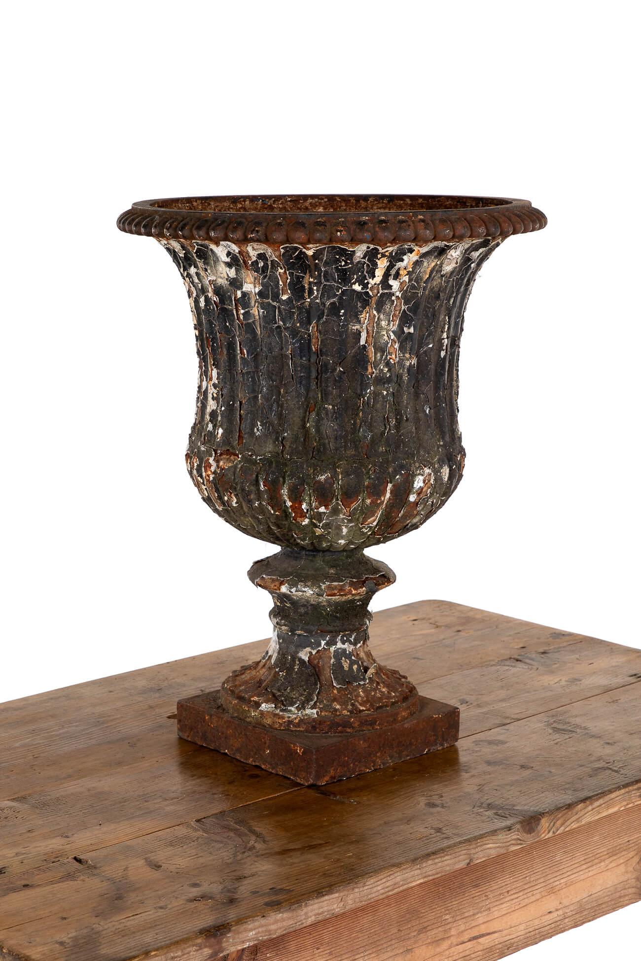 A characterful Victorian cast iron Campana style urn by the Andrew Handyside foundry of Derby.

Wonderful colour and patina with decades of chipped flaky paint adding to the appeal.

This particular urn would make the most fantastic focal point for