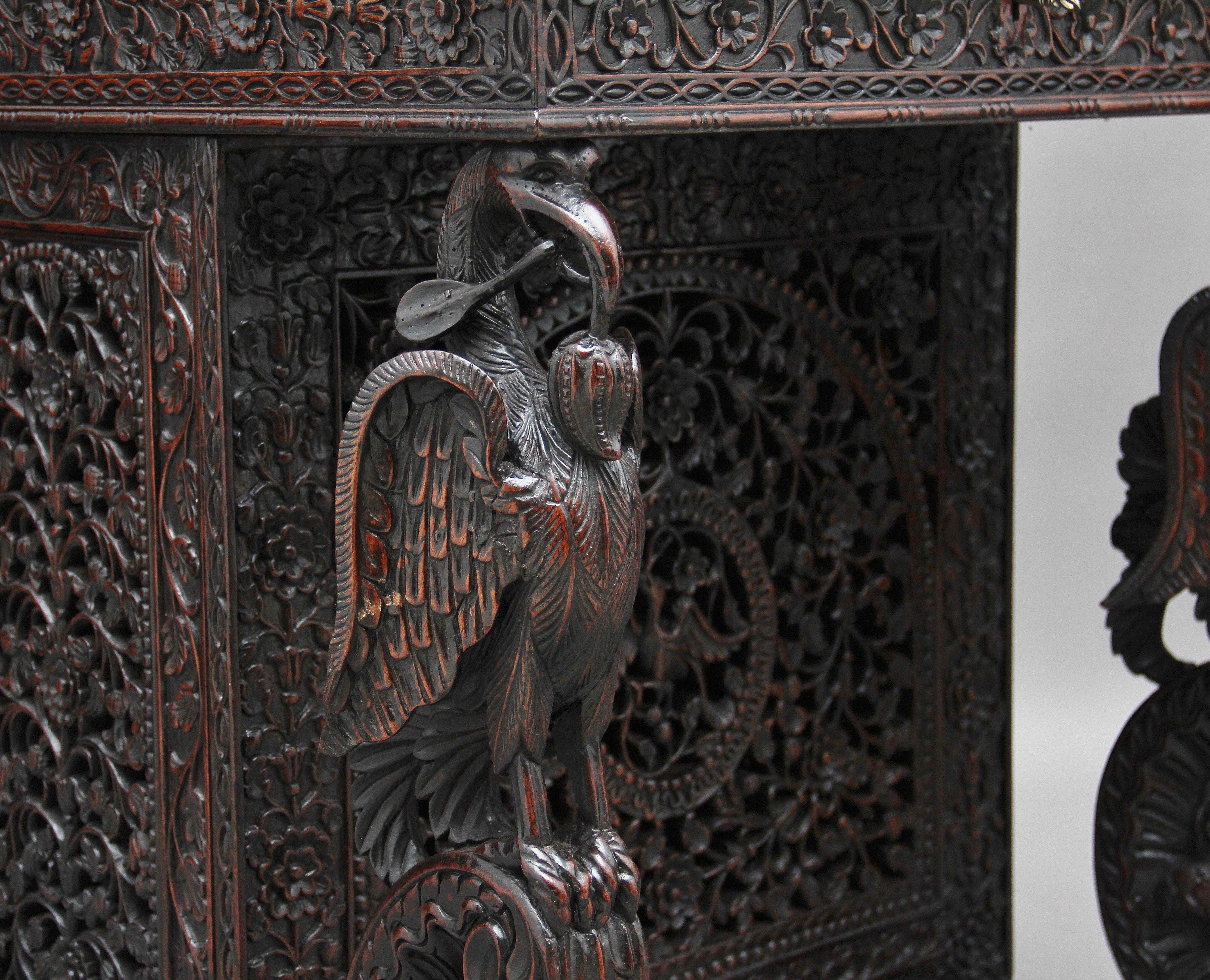 19th Century Anglo-Indian carved davenport with carved griffin supports 14