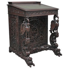 Antique 19th Century Anglo-Indian carved davenport with carved griffin supports