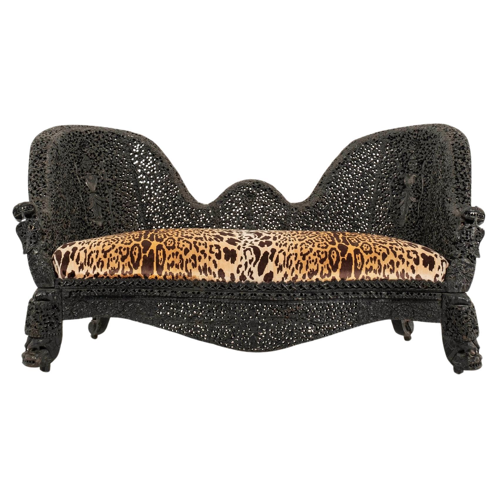 19th Century Anglo-Indian Carved Ebony Leopard Velvet Settee