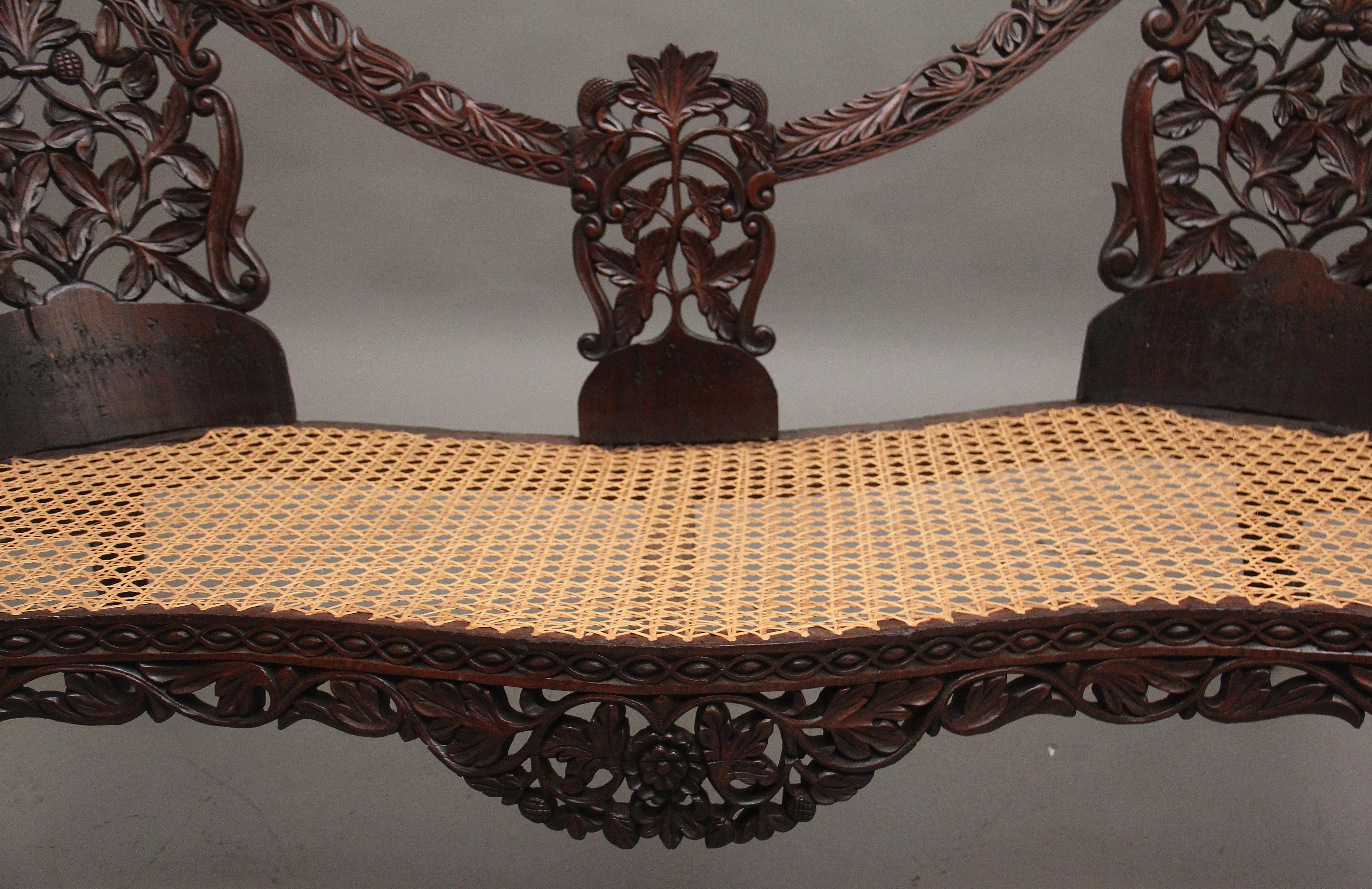 Teak 19th Century Anglo Indian carved sofa For Sale