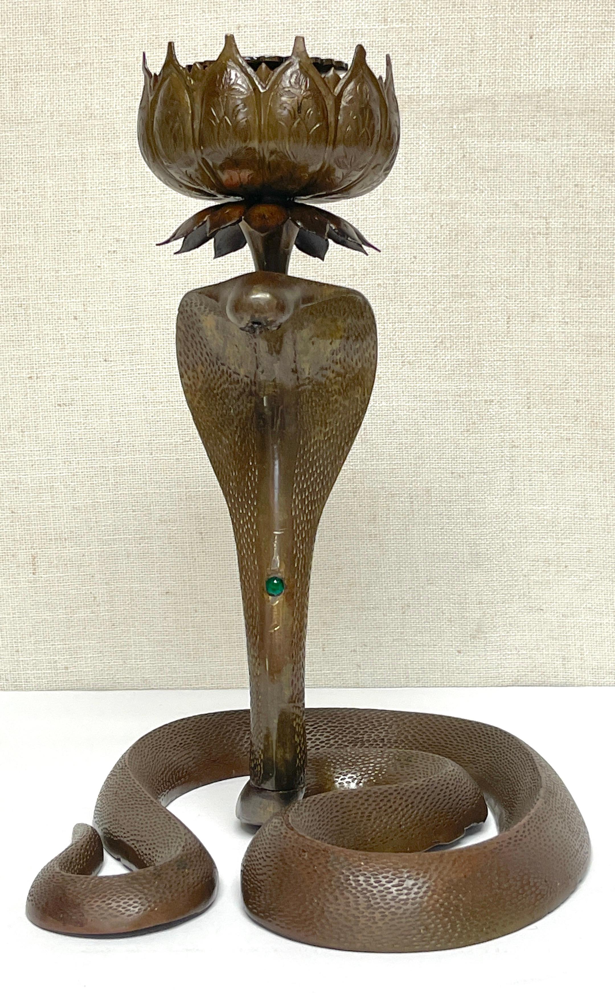 19th Century Anglo- Indian Engraved & Jeweled Bronze Cobra Candlestick 
India, Circa 1890

One the finest examples of late 19th century Anglo- Indian bronze cobra candlesticks, made for the British market. The quality of the craftsmanship of the