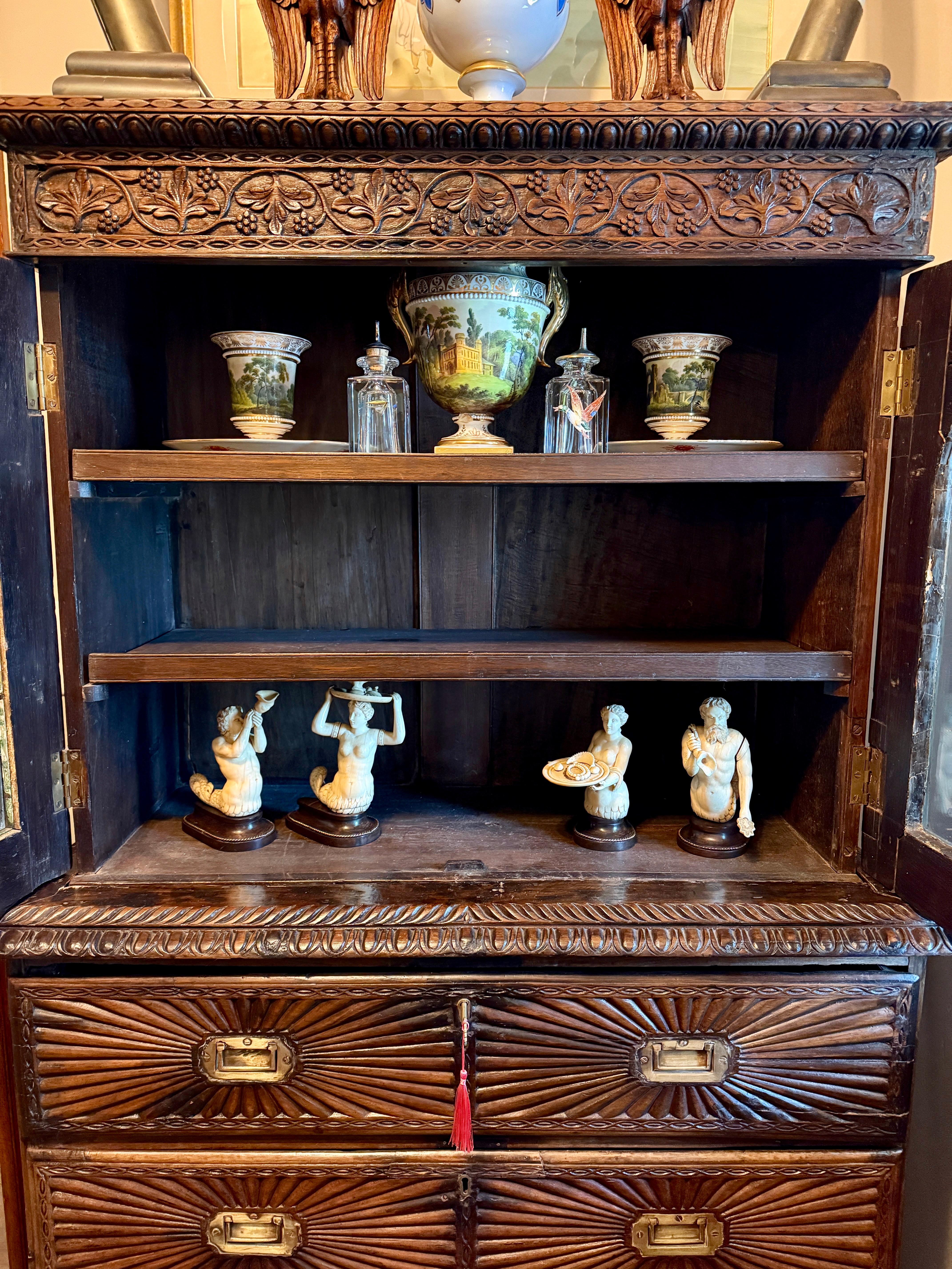 British Indian Ocean Territory 19th Century, Anglo Indian Heavily Carved Rosewood Campaign Secretary Bookcase For Sale
