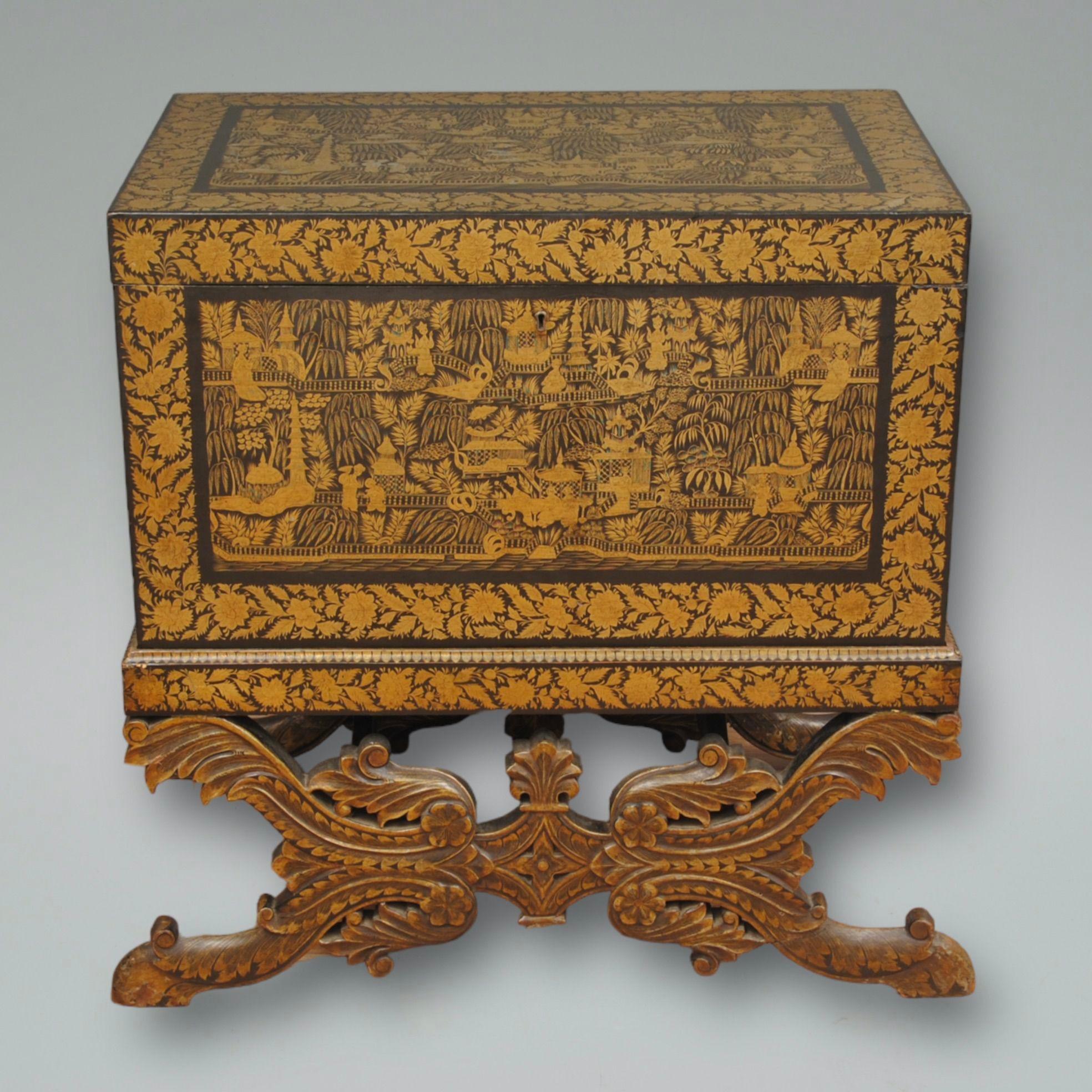 An early 19th century decorative lacquer trunk on stand, these where made in the Bareilly region and produced to export to Europe. this example is decorated with pagodas and trees, and has the original blue colour inside
Circa 1830