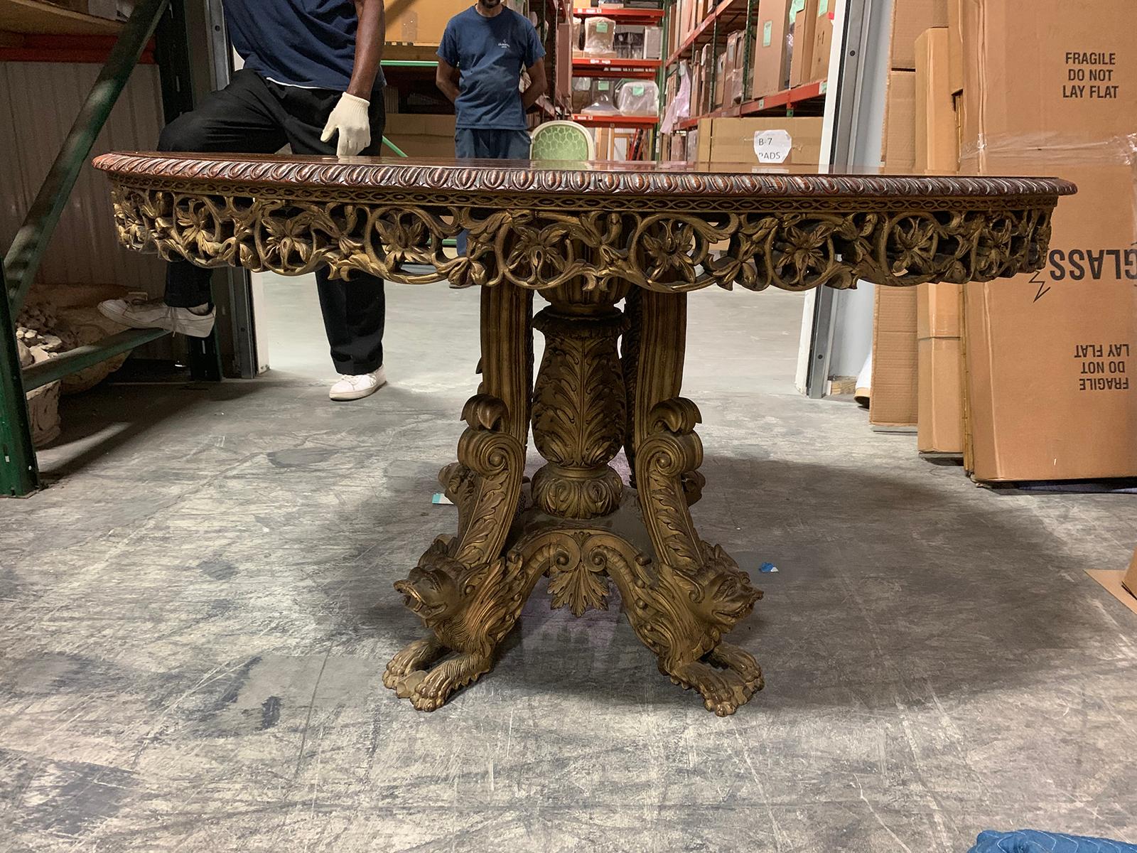 19th century Anglo-Indian parcel gilt & carved tilt-top table, lion form feet
Tropical exotic wood
Possibly Indian or Indonesian.