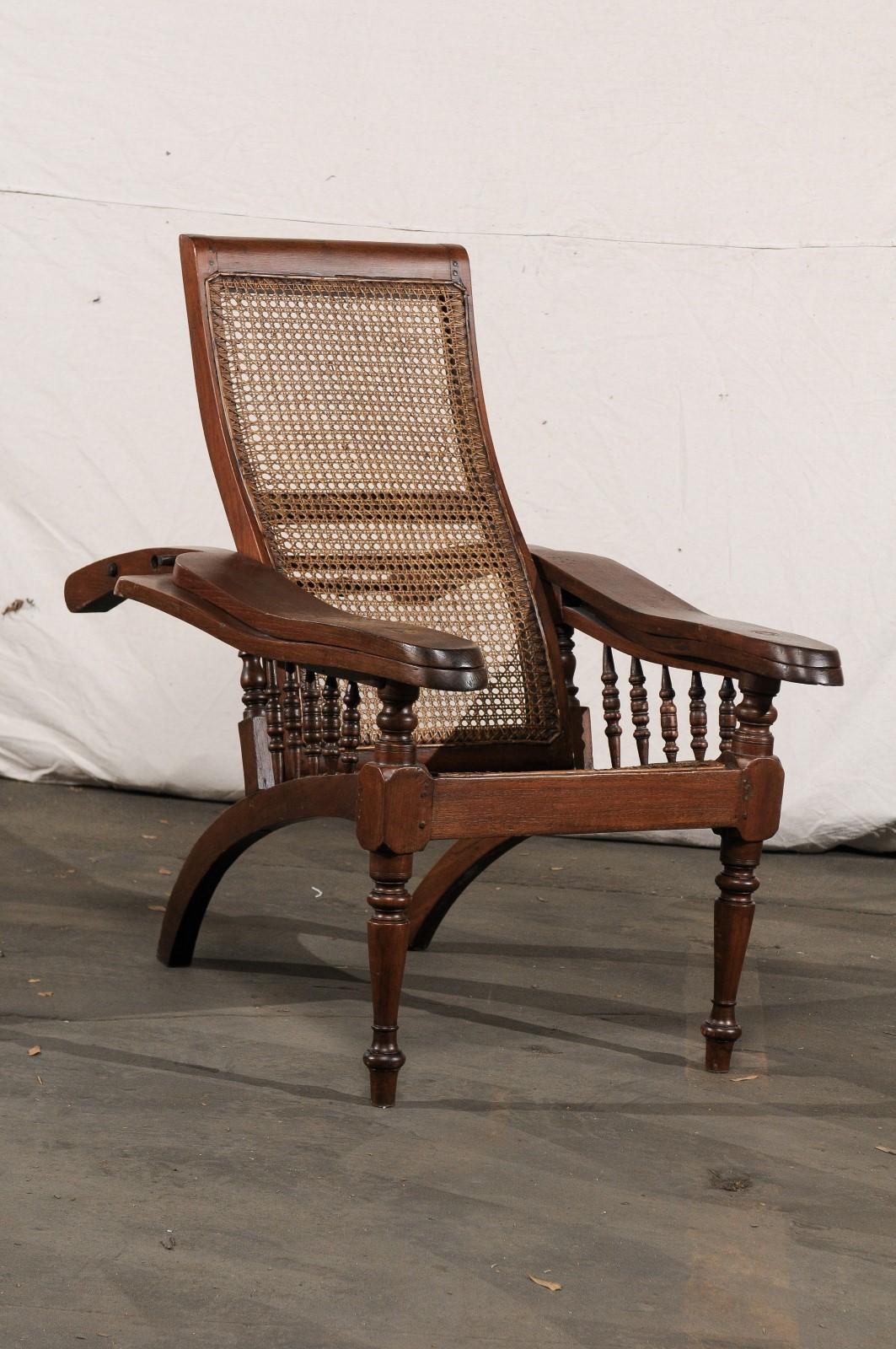 19th Century Anglo-Indian Caned Planters Chair with Leg Stretchers, Metamorphic, and brass screws
31.5