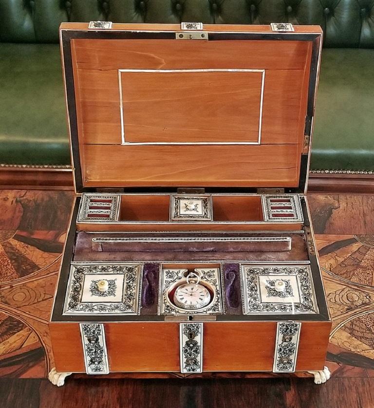 Gorgeous and rare early 19th century, circa 1810, Ladies Jewelry casket or necessaire.

Made in Vizagapatam, India.

Made of Sandalwood with bone/faux ivory and ebony banding. The banding is hand-painted in floral designs using lac ink (made from