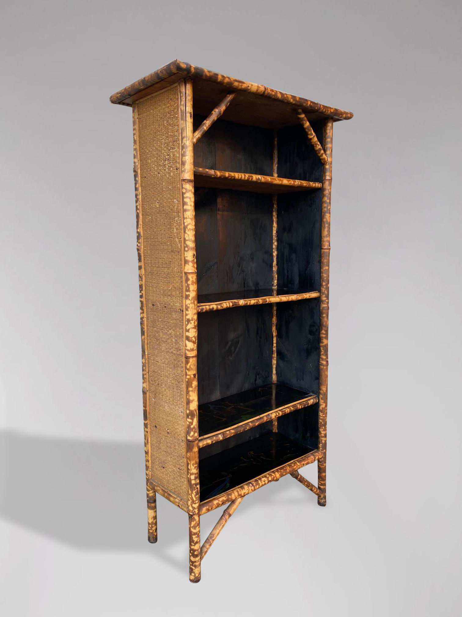 A very decorative 19th century, Anglo Japanese style tiger bamboo shelving cabinet. Rectangular top with three internal fixed shelves. This beautiful and unusual cabinet has lacquered and hand decorated painted designs to each shelf. Good condition