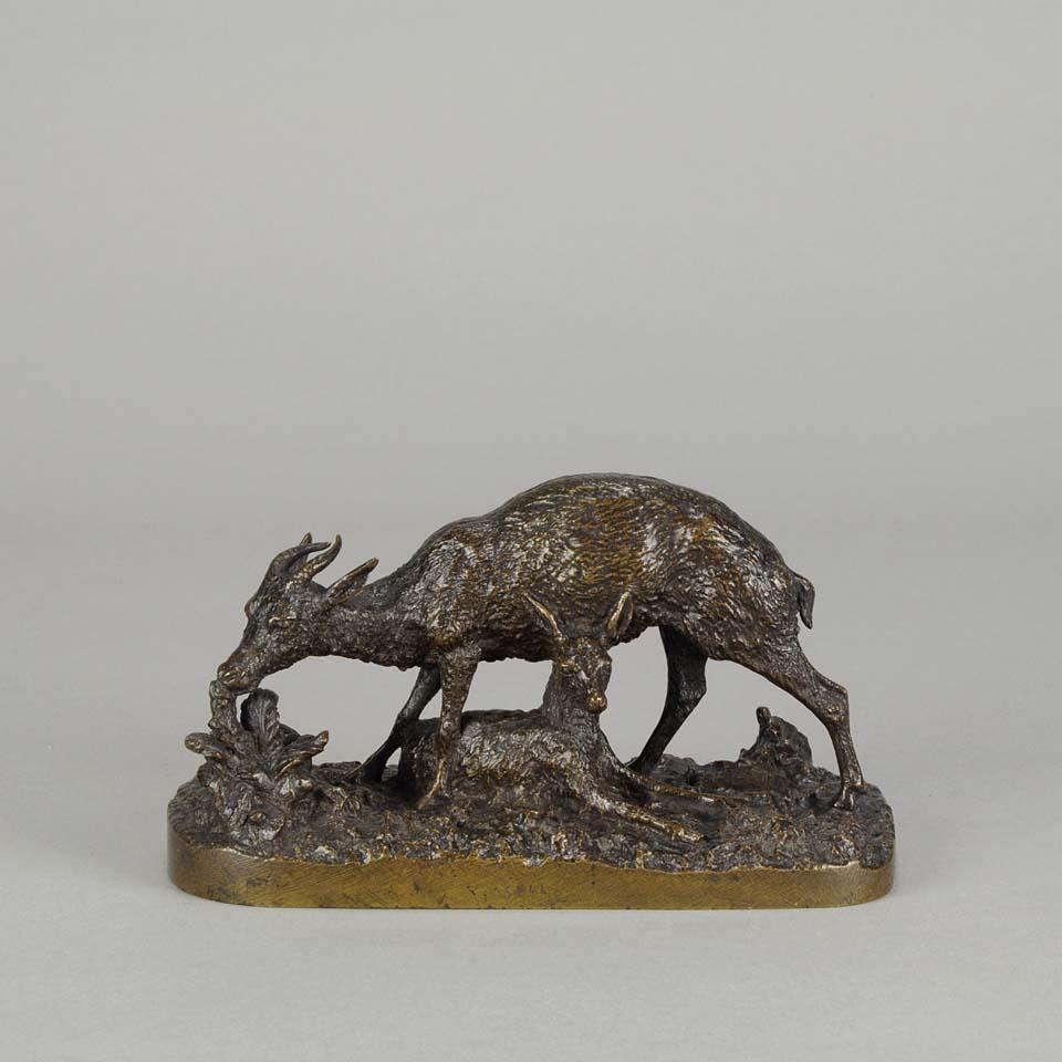 A very fine Animalier bronze study of a feeding gazelle with her fawn reclining at her feet. The bronze with rich brown patina and excellent detail raised on a naturalistic base, signed Fratin and engraved with title to the fore ‘Gazelle’
Additional