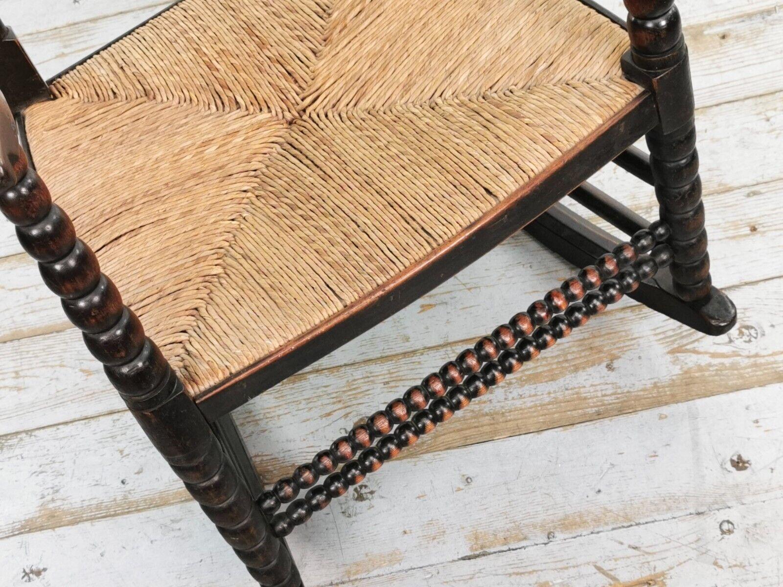 Silla mecedora antigua Arts and Crafts del siglo XIX, de bobina ebonizada en venta 5