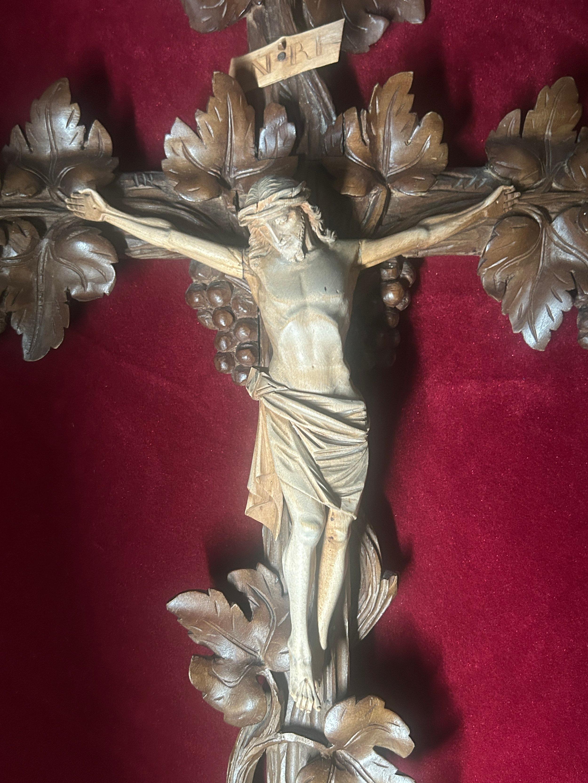 Wood 19th Century Antique Black Forest Carved Crucifix with Corpus Christi & Vines For Sale
