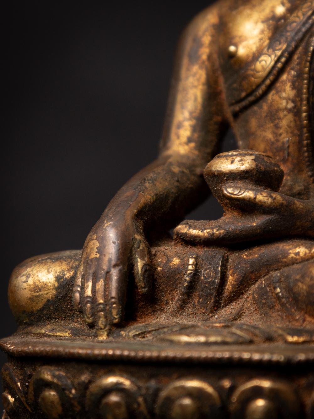 19th century antique bronze Nepali Buddha statue in Bhumisparsha Mudra For Sale 10