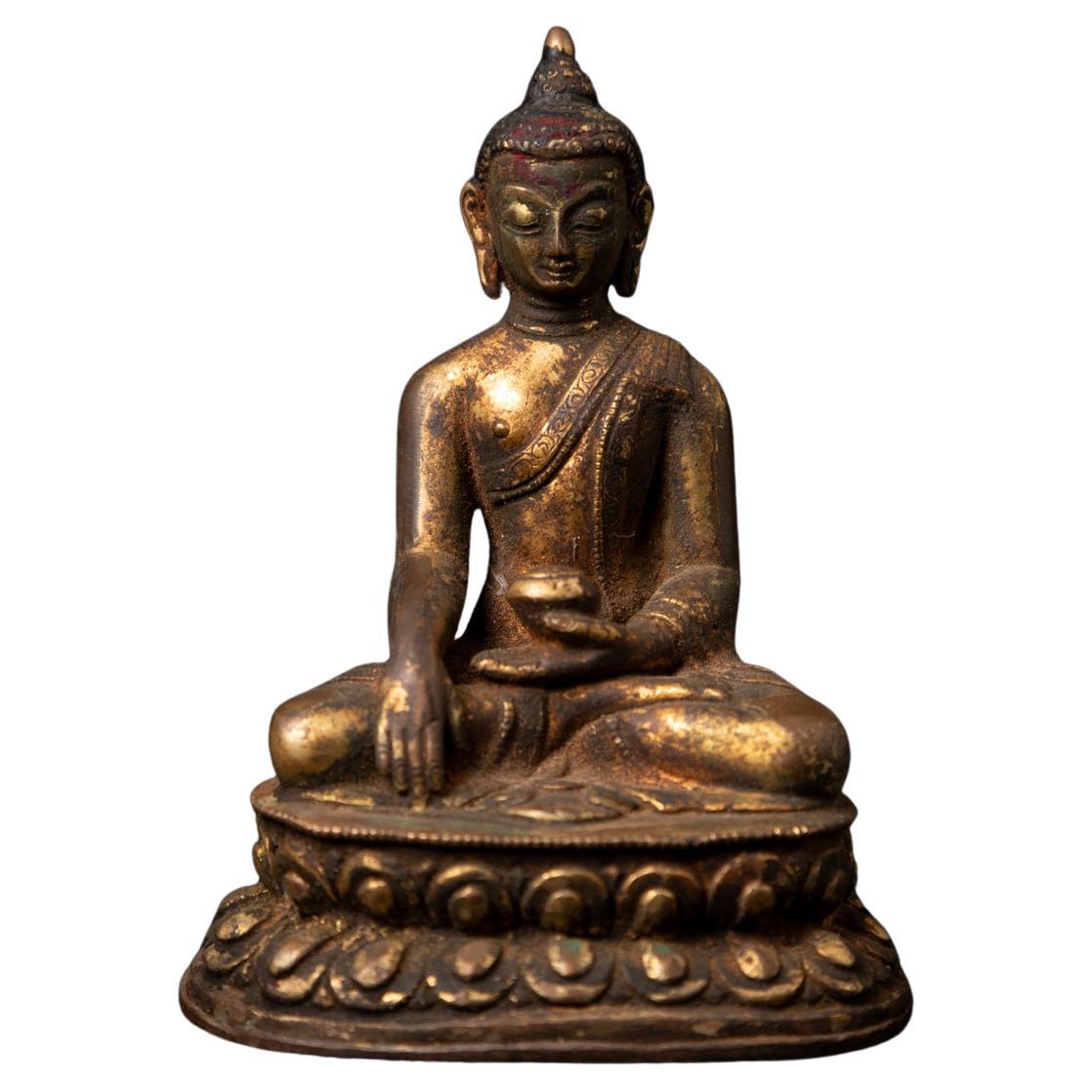 19th century antique bronze Nepali Buddha statue in Bhumisparsha Mudra