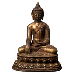 19th century Antique bronze Nepali Buddha statue in Bhumisparsha Mudra