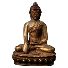 19th century antique bronze Nepali Buddha statue in Bhumisparsha Mudra