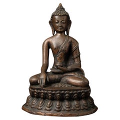 19th century Antique bronze Nepali Buddha statue in Bhumisparsha Mudra