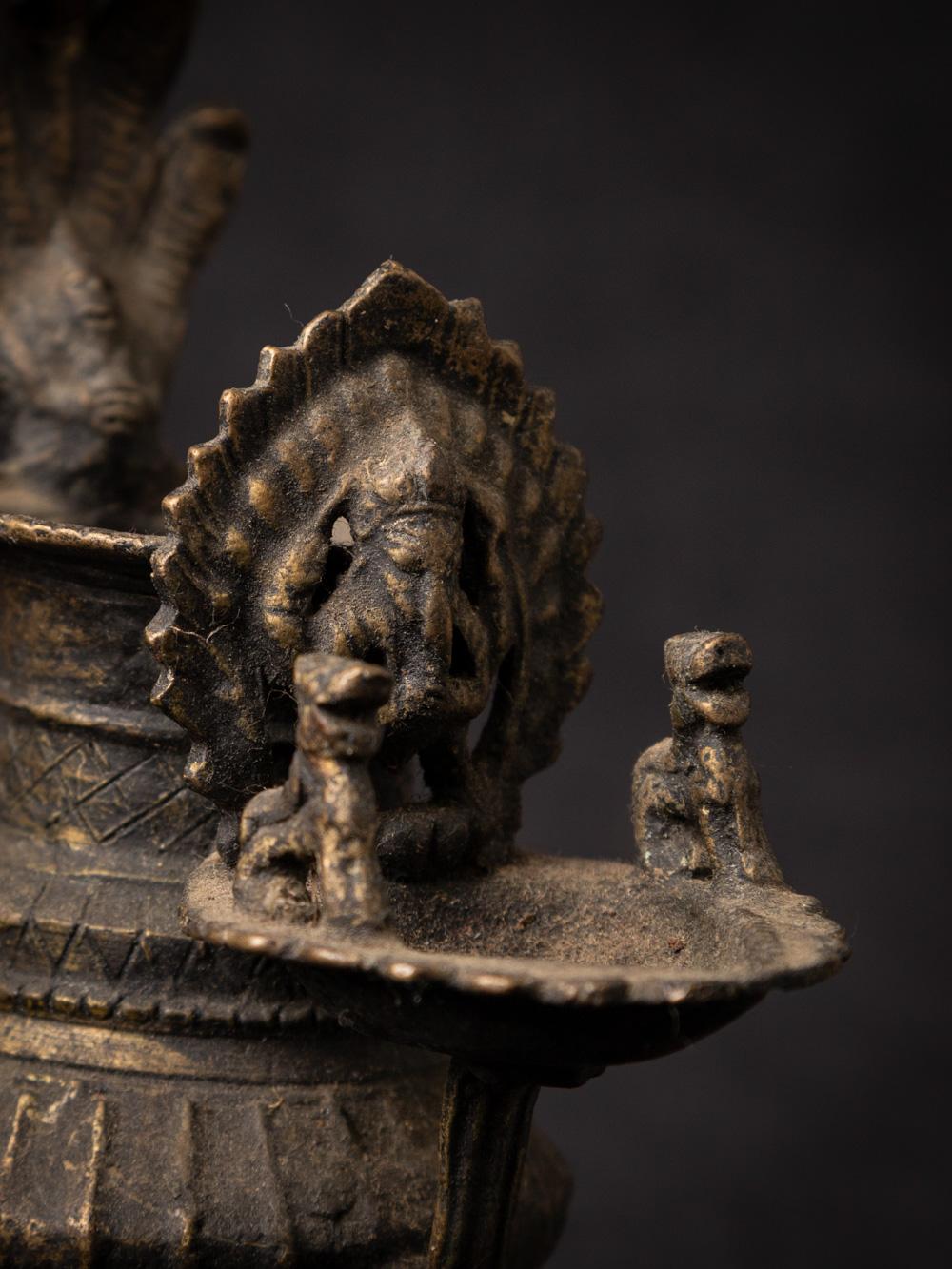 19th Century 19th century antique bronze Nepali Oil lamp (Sukunda) with Ganesh statue