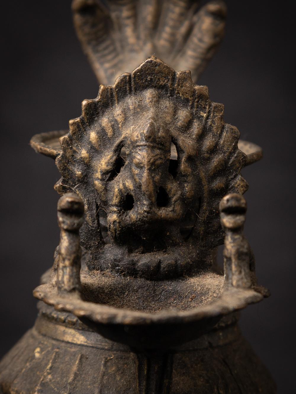 Bronze 19th century antique bronze Nepali Oil lamp (Sukunda) with Ganesh statue
