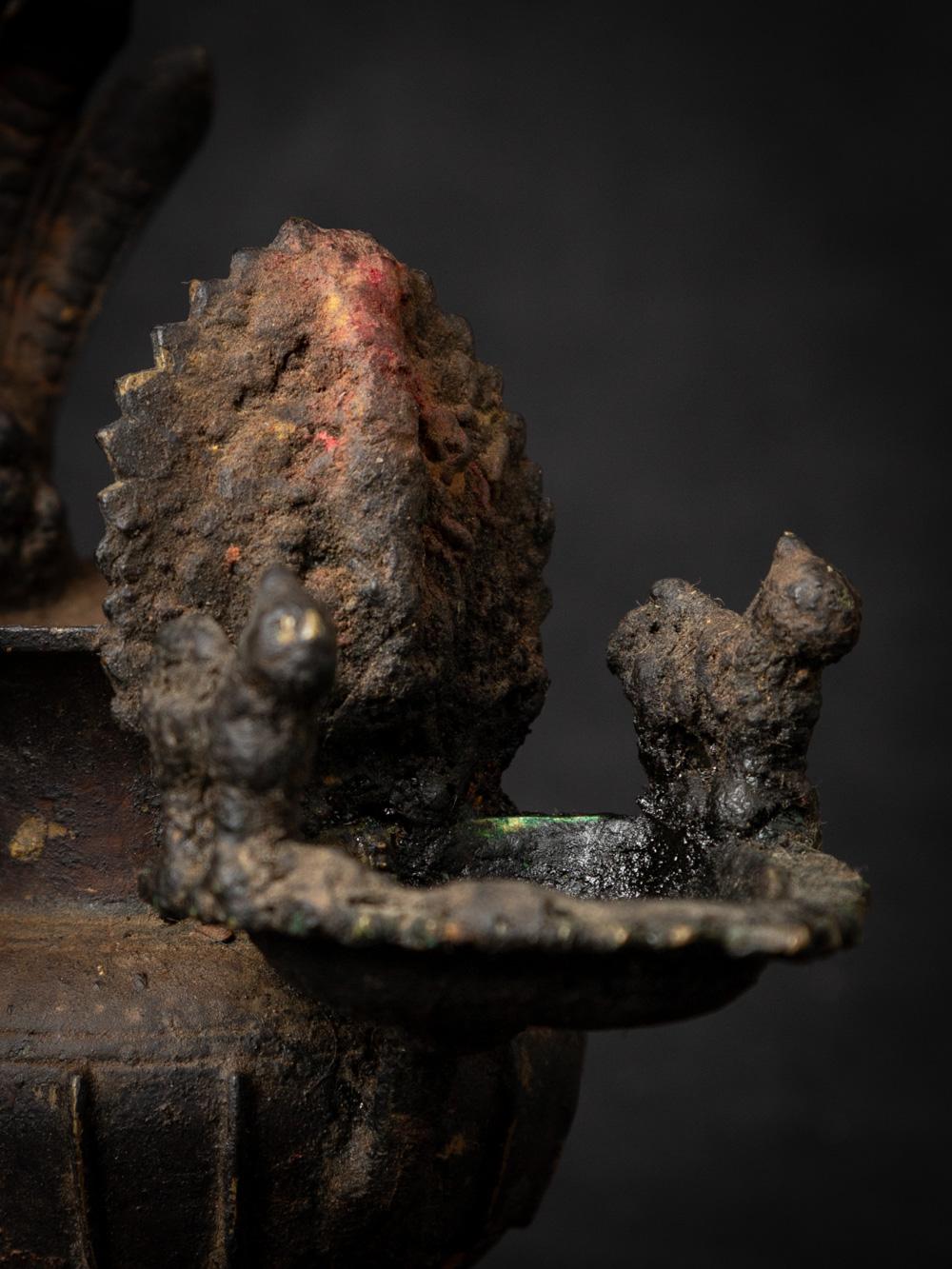 19th Century 19th century antique bronze Nepali Oil lamp (Sukunda) with Ganesha figure