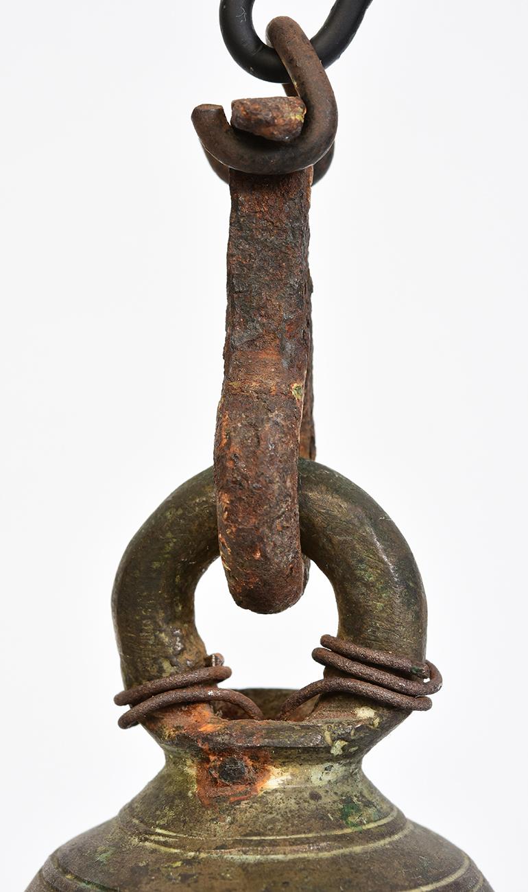 vintage bells on stand