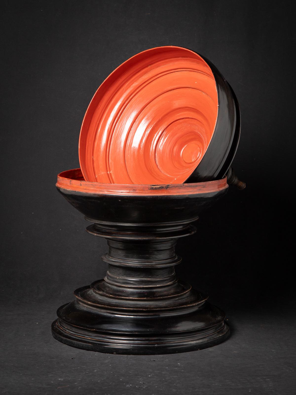 The Antique Burmese offering vessel is a remarkable significant artifact originating from Burma. Crafted from lacquerware, each statue stands at 92,5 cm in height and measures 46 cm diameter. 

Created in the 19th century, Was probably part of a