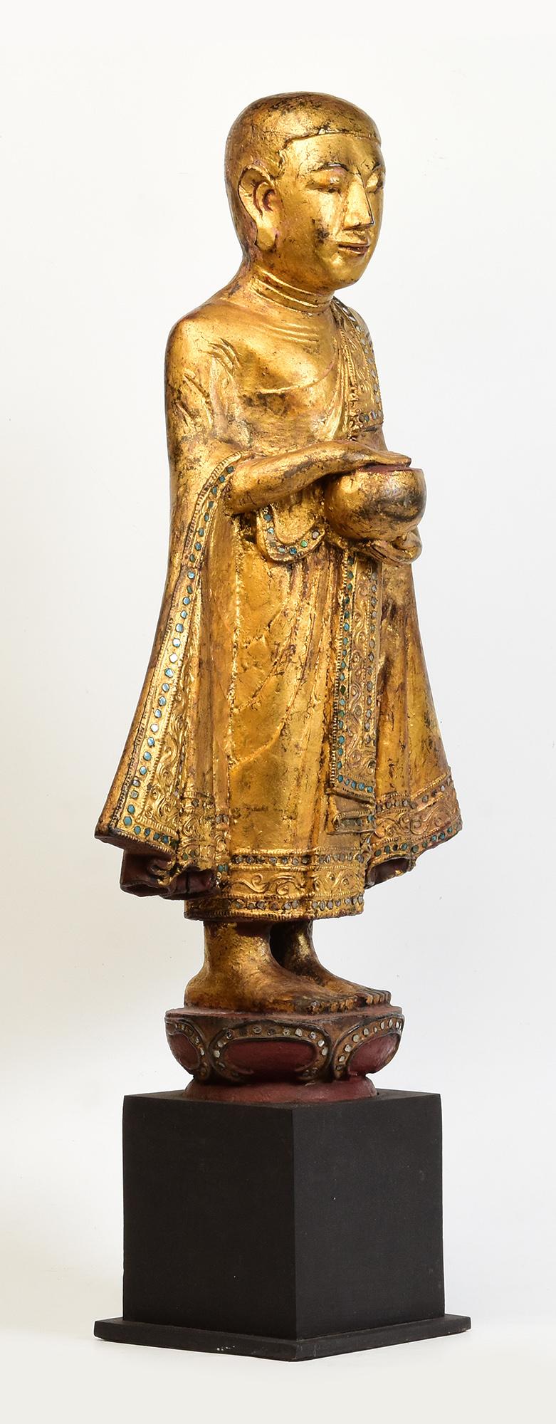 19th Century, Antique Burmese Wooden Standing Disciple / Monk Holding Bowl For Sale 8