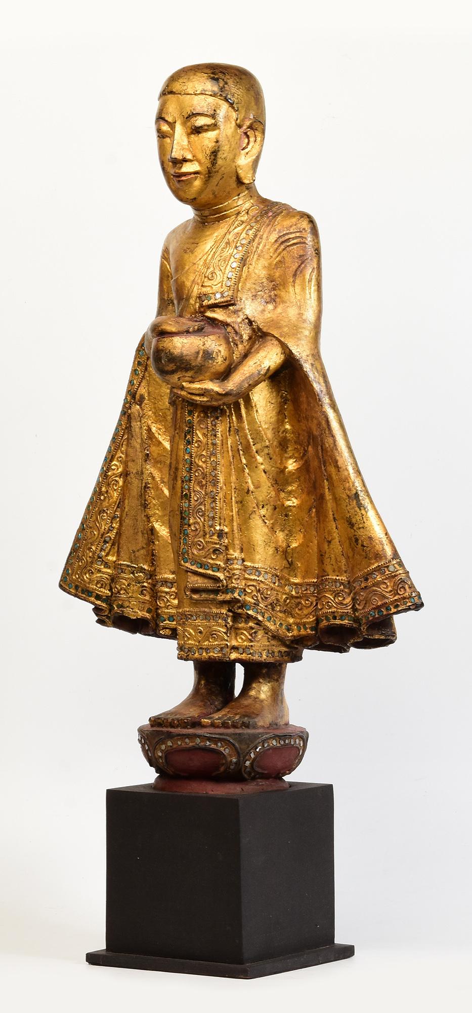 19th Century, Antique Burmese Wooden Standing Disciple / Monk Holding Bowl For Sale 3