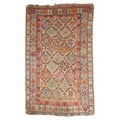 Zabihi Collection 19th Century Used Caucasian Rug