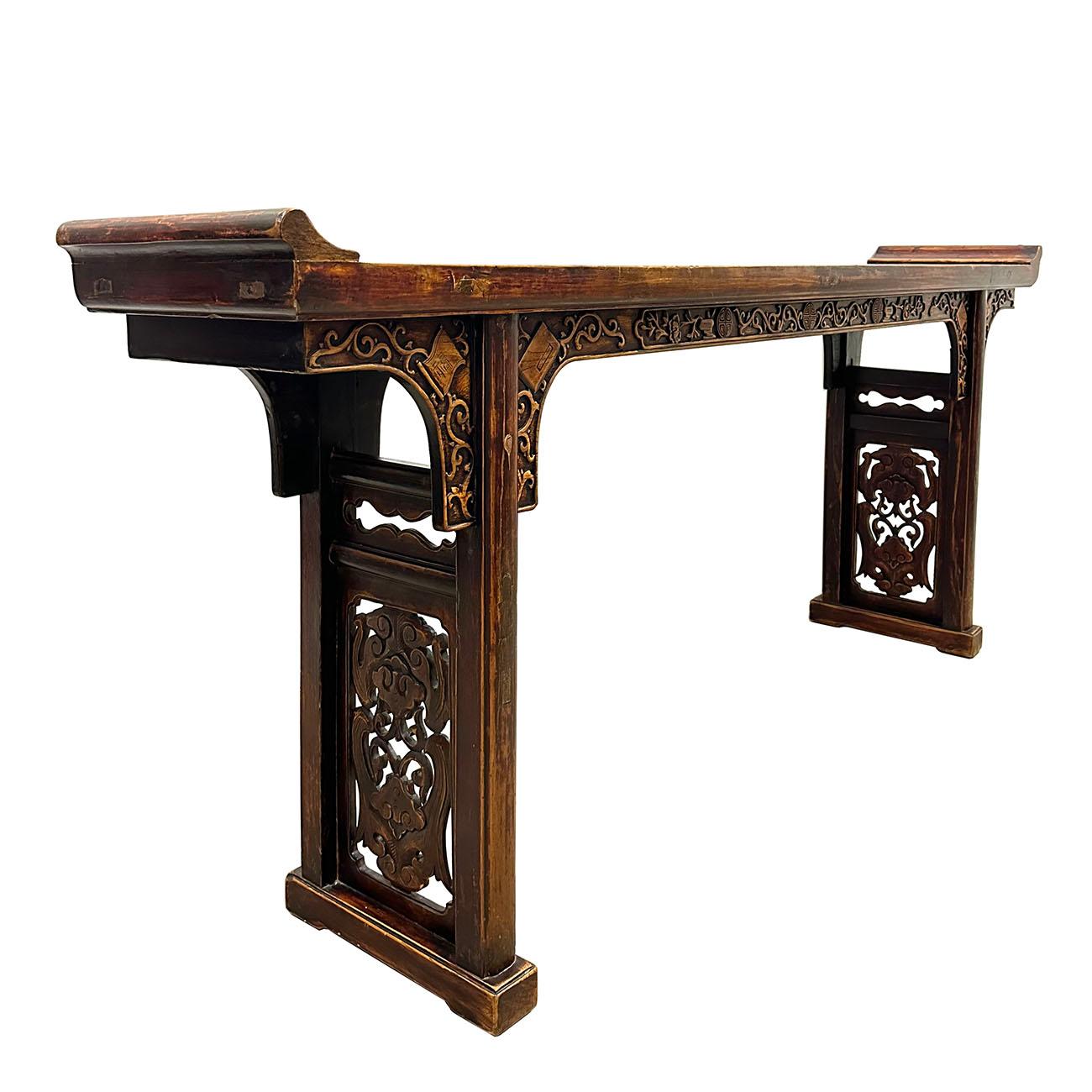 This Antique Carved Altar table from China was made in late 19th century and still maintained very good condition. It shows the traditional style of Northern China's cultural. This Chinese antique altar table was made from solid wood with raised