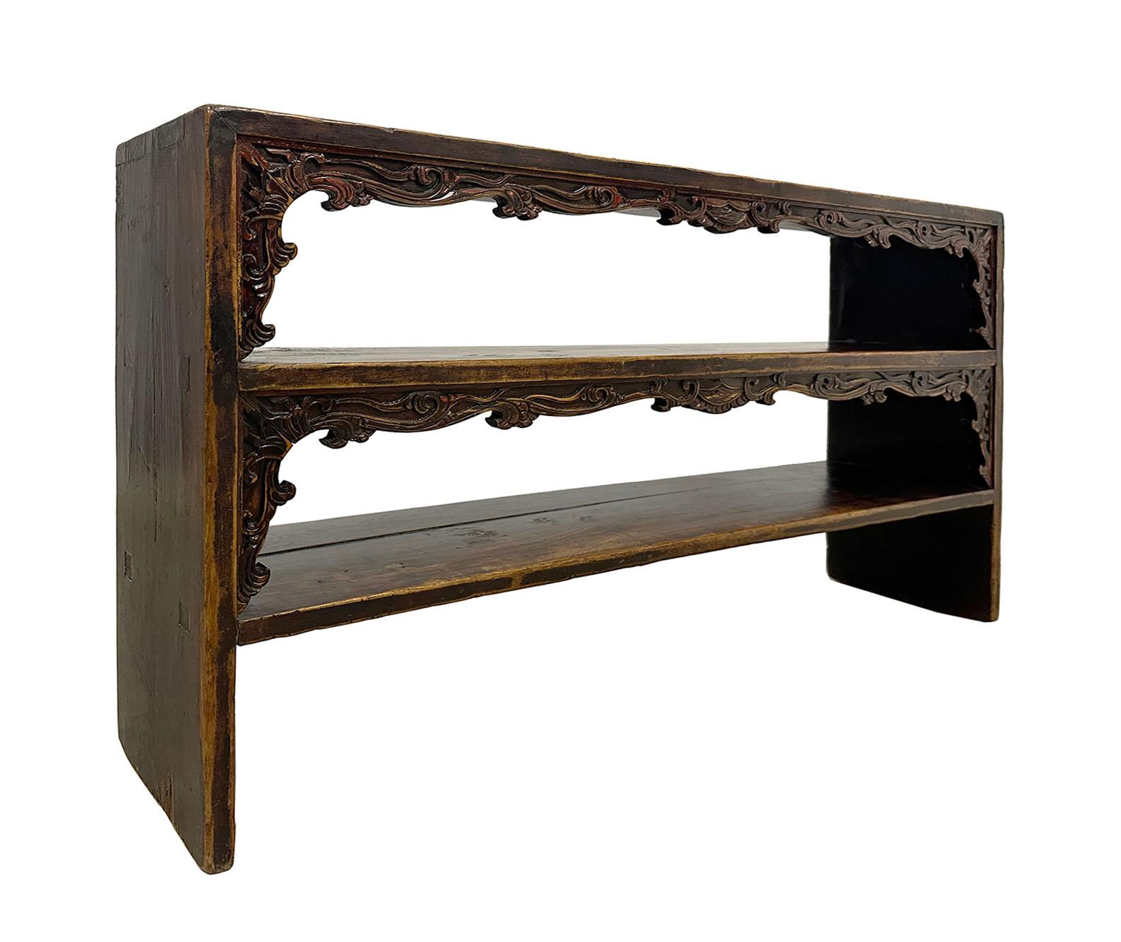 This gorgeous Chinese antique carved display shelf is in the original condition, all hand carved and in it's original finish, from Shan Xi, China. It has two layers of display shelf to display your treasures on it. This display has beautiful
