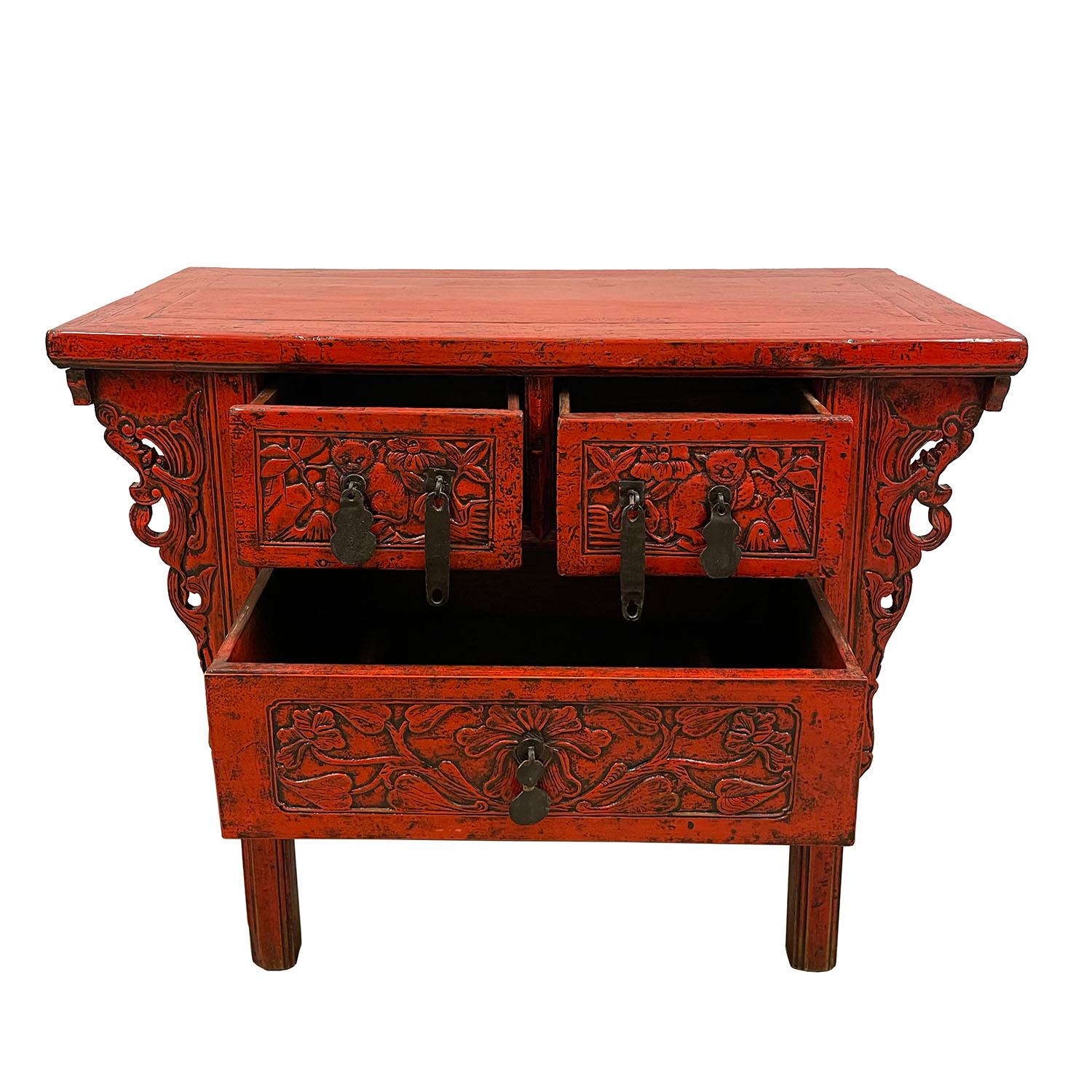 carved red lacquer table