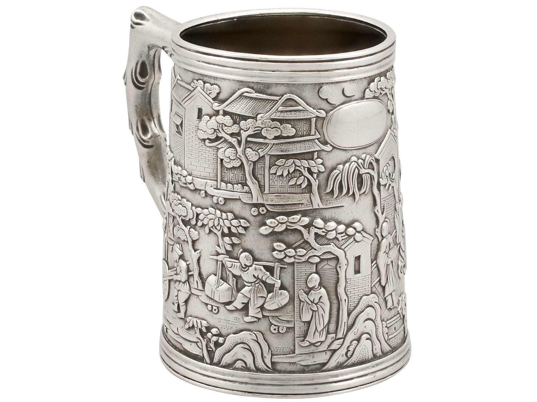 An exceptional, fine and impressive antique Chinese Export silver mug; an addition to our antique silver collection

This exceptional antique Chinese Export silver mug has a tapering cylindrical form.

The surface of this impressive Chinese