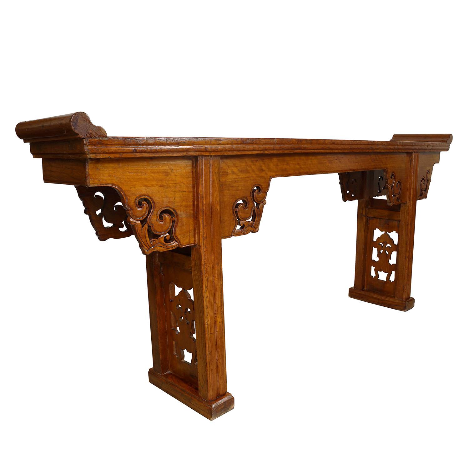 Size: 35in H x 87in W x 13.5in D
Origin: China
Circa: 1800 - 1900
Material: Elm Wood
Condition: Original finish, solid wood construction, hand carved, very heavy, sturdy, normal age wear.

Look at this Antique Open Carved Altar table from China. It