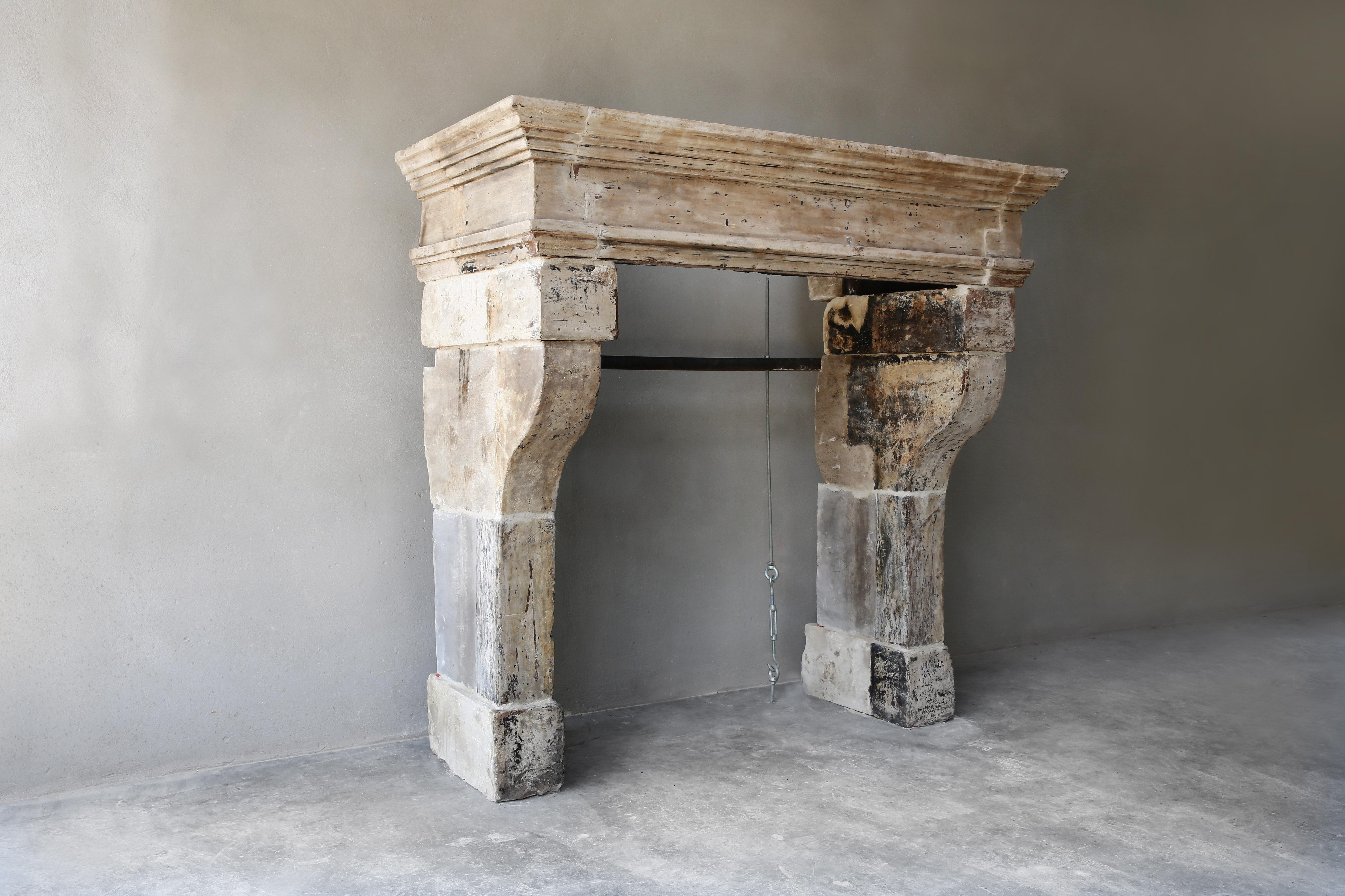 Robust castle fireplace from the 19th century in style of Campagnarde! The top has beautiful lines. In its entirety this is a characteristic fireplace with a lot of charisma and allure! Castle fireplaces can also be used for many homes.