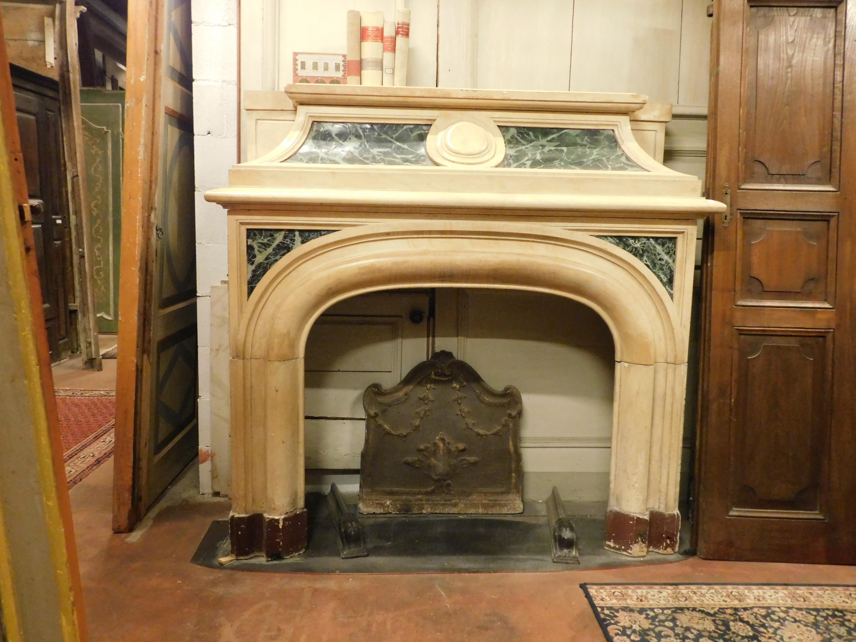 Antique fireplace in yellow marble, with green lacquered faux-marble parts, an important marble fireplace (covering the chimney) from a villa in Italy (Rome) in the 1800s, on the sides it has brass vents to make the fireplace 