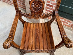 chaise curule en chêne français sculpté du 19ème siècle Trône à bras Renaissance