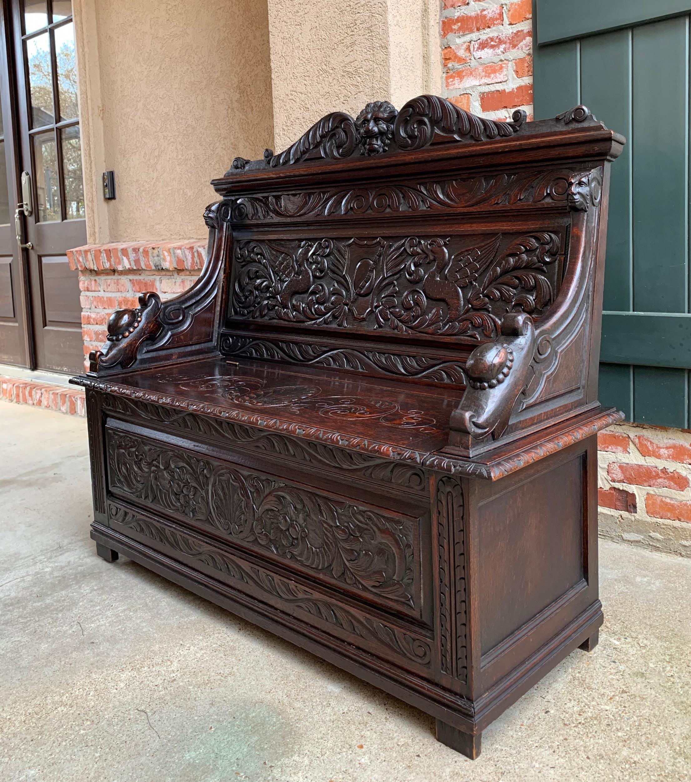 19th century antique French carved oak hall bench trunk chest Renaissance lion

~Direct from France~
~Outstanding carvings throughout all the panels on this stunning 19th century French hall bench, in a very versatile size, perfect for placement