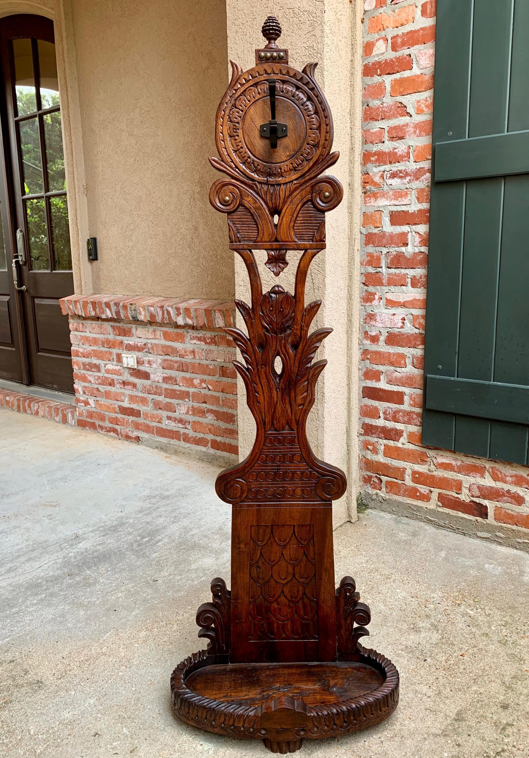 19th century antique French carved oak standing coat hat rack umbrella stand

~Direct from France~
~Lovely and versatile antique French standing coat or hat rack!~
~Unique hand carved designs from the top of the carved finial to the lower oval