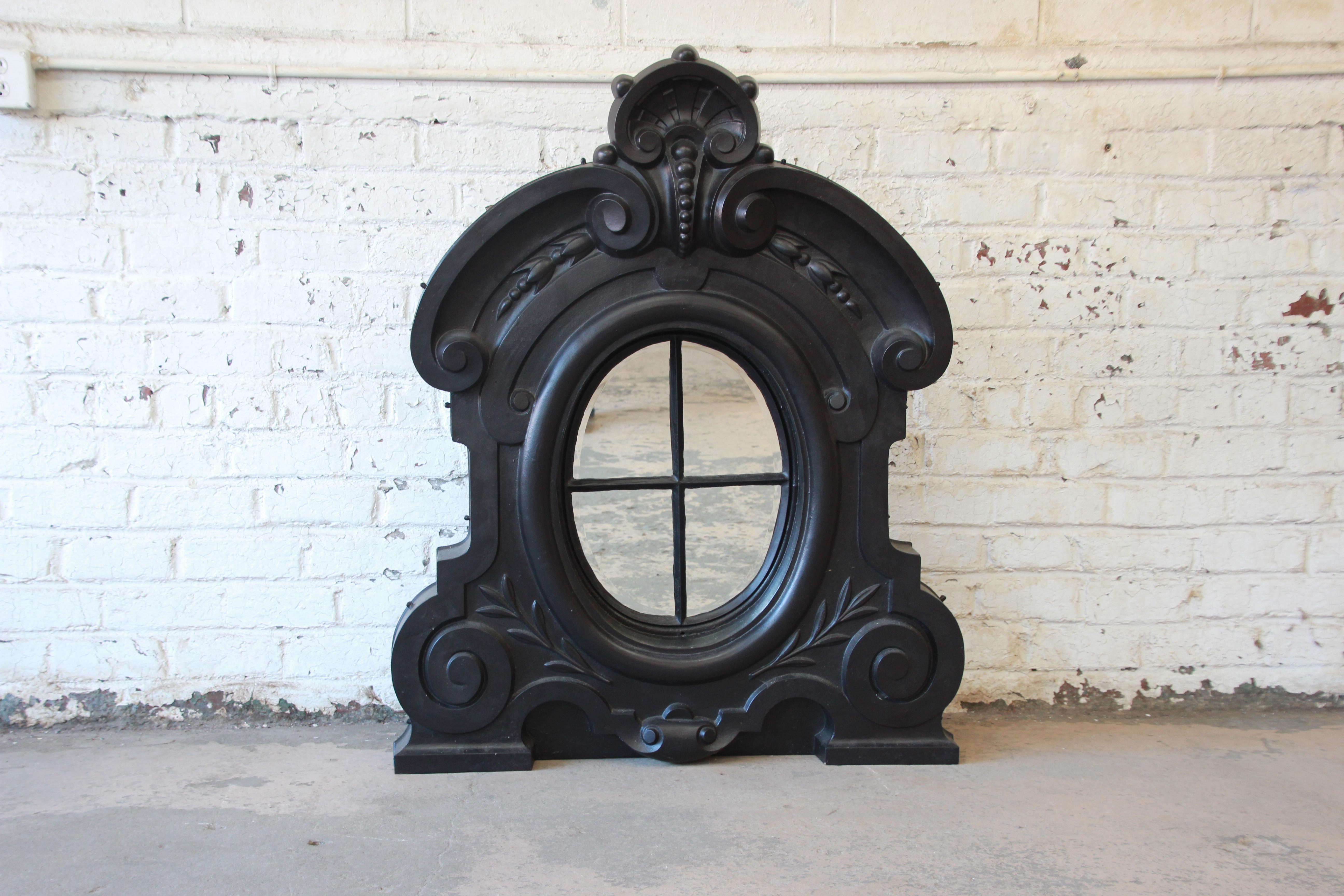 Offering a very rare and unique 19th century French dormer from France. Historically this beauty sat at the top of a large French chateau. This piece is made from poured cast iron and the centre window has been replaced with a mirror. It has